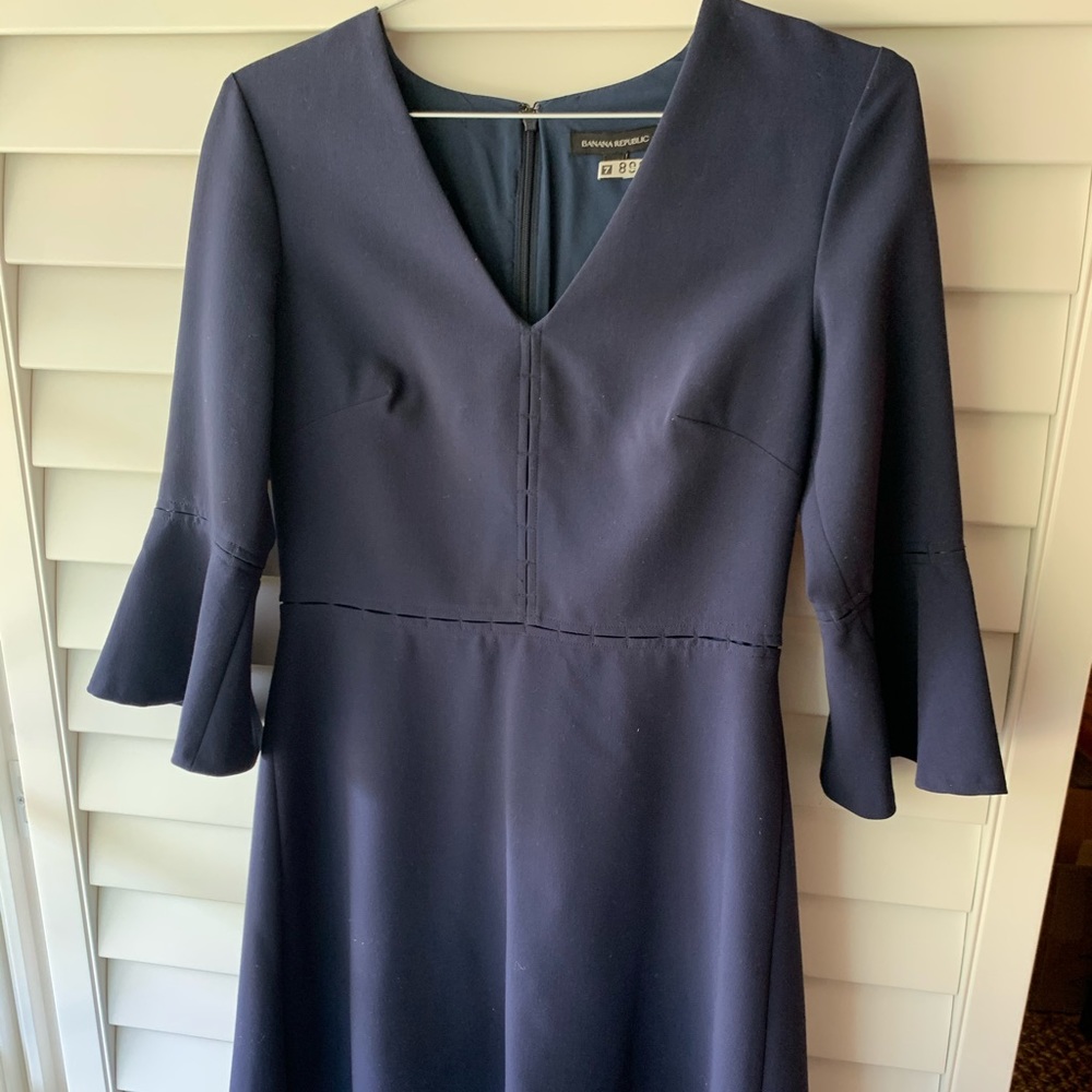 Navy banana rep peplum sleeve dress
